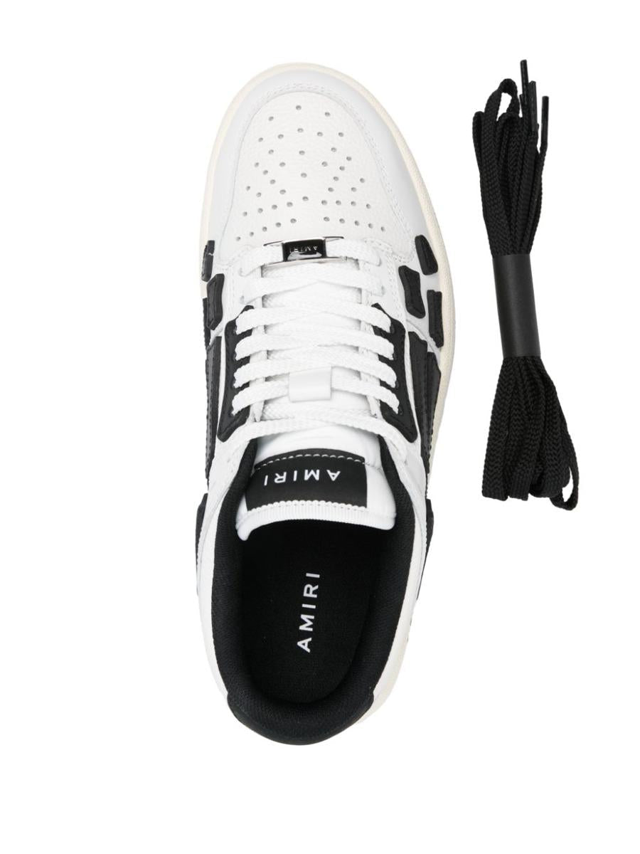 Amiri – Weiße Ledersneaker mit schwarzen Details