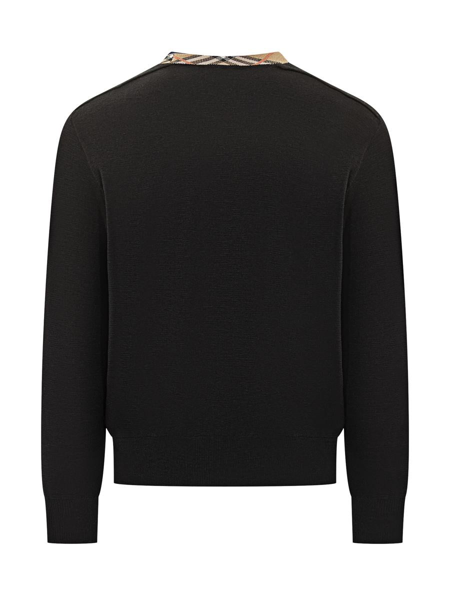 Burberry – Schwarzer Pullover mit Rundhalsausschnitt und Burberry-Karomuster