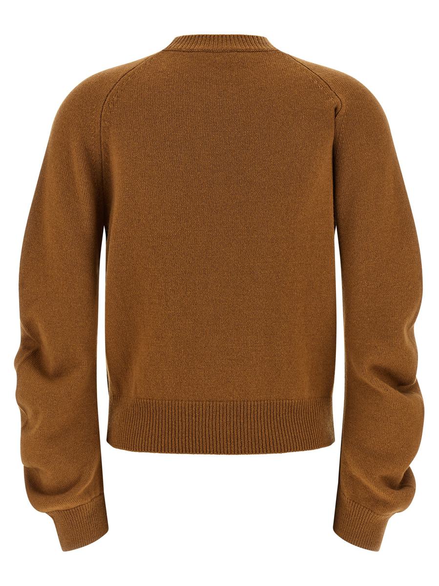 Hautfarbener Pullover mit abgerundeten Ärmeln