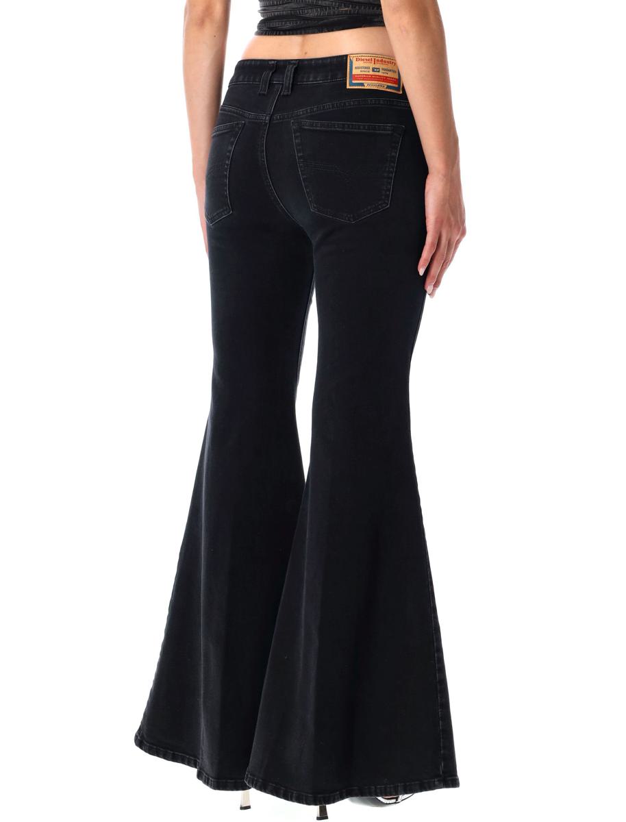 Diesel – Schwarze, tief sitzende Schlagjeans 1970 D-Bleess
