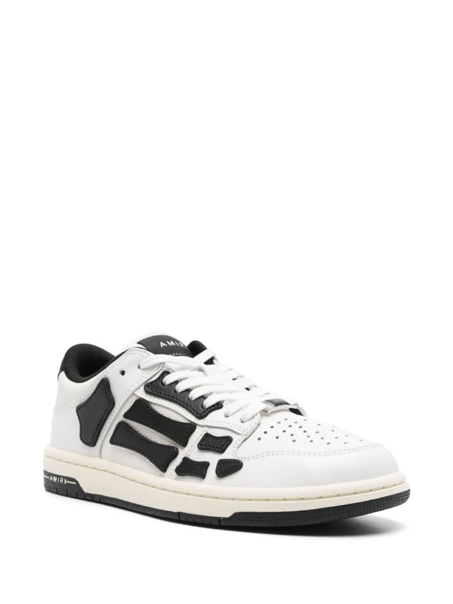 Amiri – Weiße Ledersneaker mit schwarzen Details