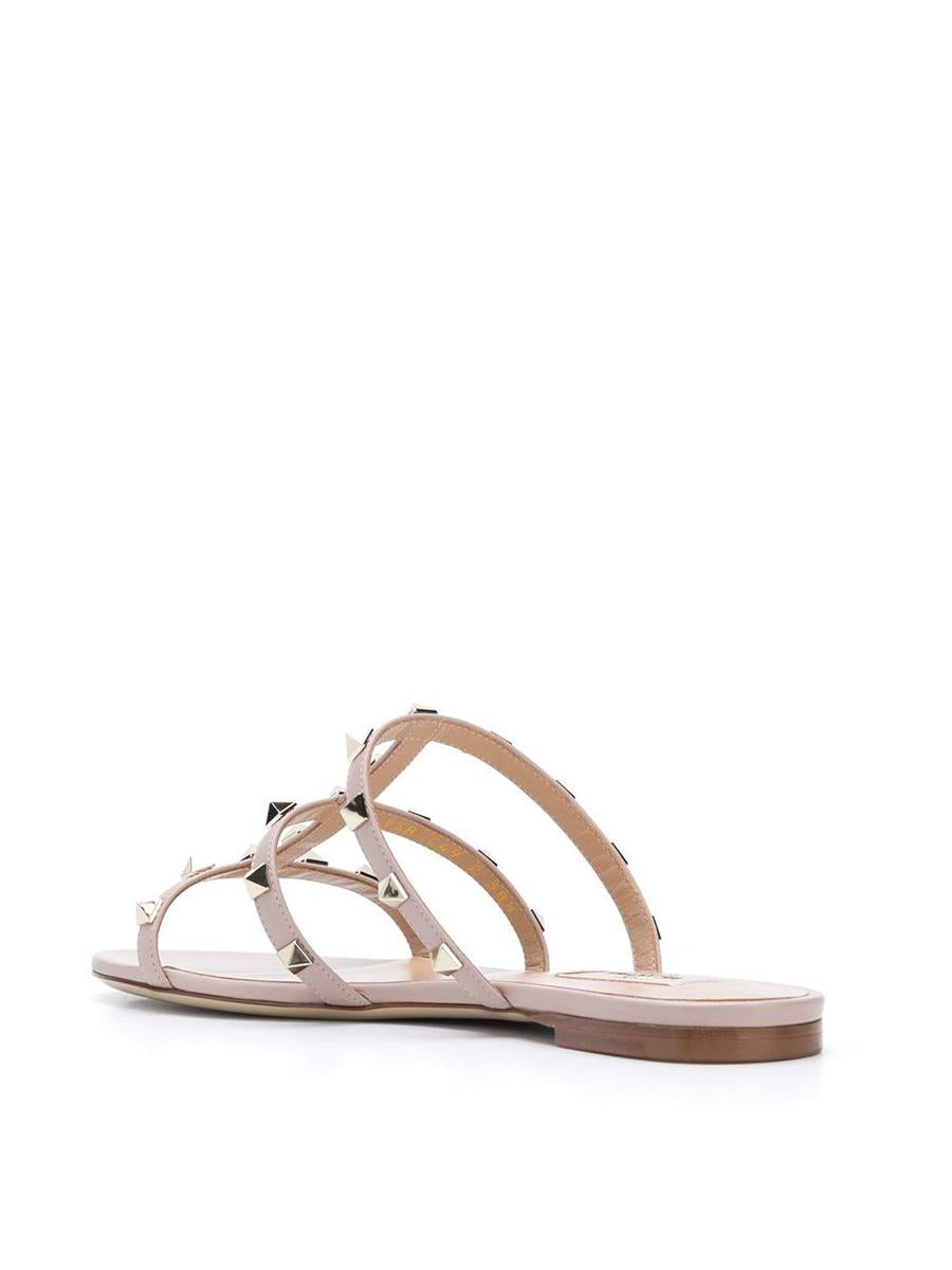 Valentino Garavani – Flache Sandalen „Rockstud“ aus Leder