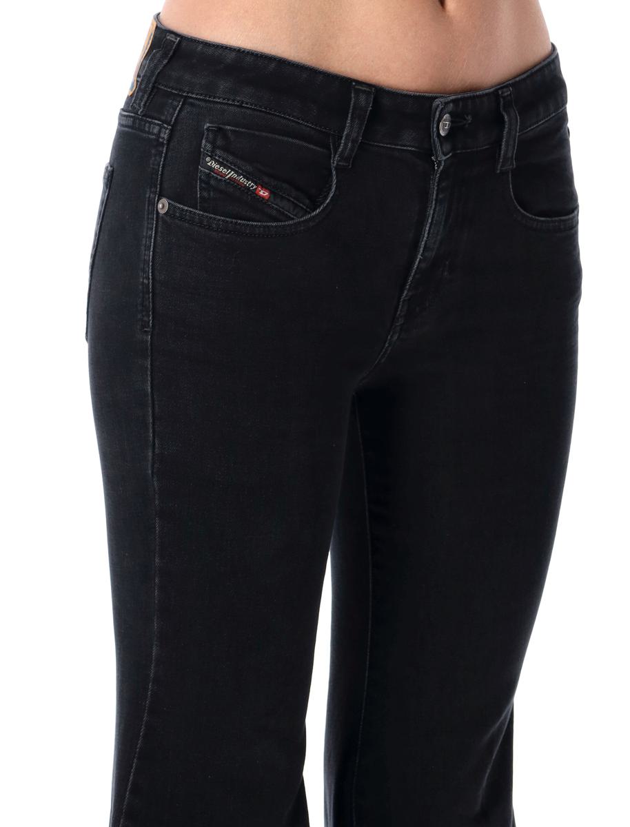 Diesel – Schwarze, tief sitzende Schlagjeans 1970 D-Bleess