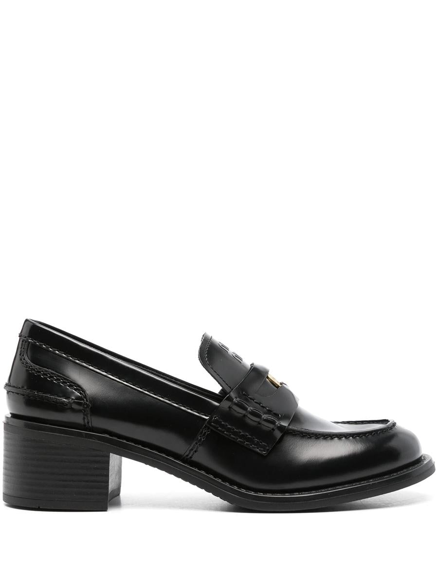 Miu Miu Pennyloafer aus gebürstetem Leder