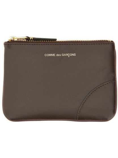 Kleine Clutch von Comme Des Garçons mit Reißverschluss, Unisex