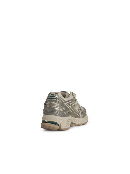 New Balance „1906R“ silberne Sneaker aus Ledermischung