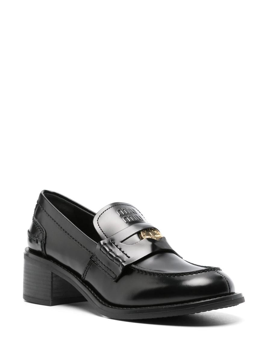 Miu Miu Pennyloafer aus gebürstetem Leder