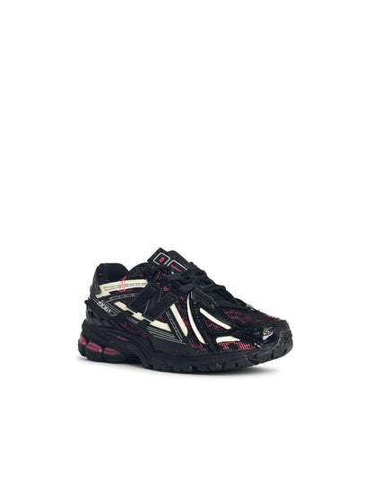 New Balance „1906“ – Schwarze Sneaker aus Stoffmischung