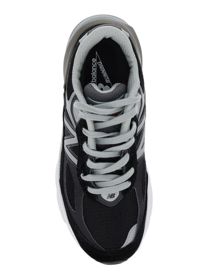 Schwarze Low-Top-Sneakers mit Logo-Detail aus Wildleder und technischem Gewebe für Damen