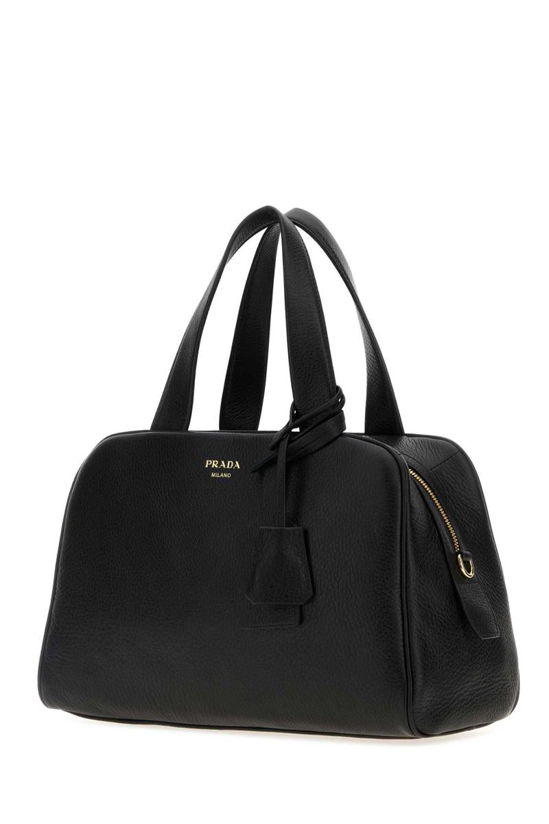 Prada-Handtaschen.