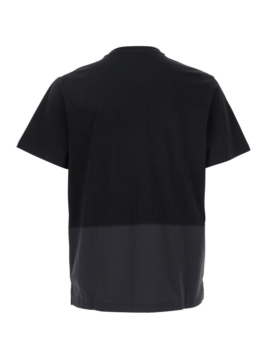 Schwarzes T-Shirt „Clint“ mit Rundhalsausschnitt und Logodetail auf der Vorderseite aus Baumwolle