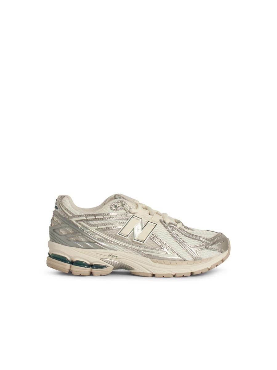 New Balance „1906R“ silberne Sneaker aus Ledermischung