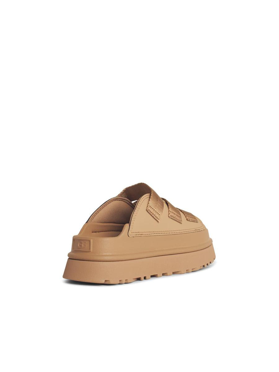 UGG „Goldenglow“ Hausschuhe aus beigem Stoffmix