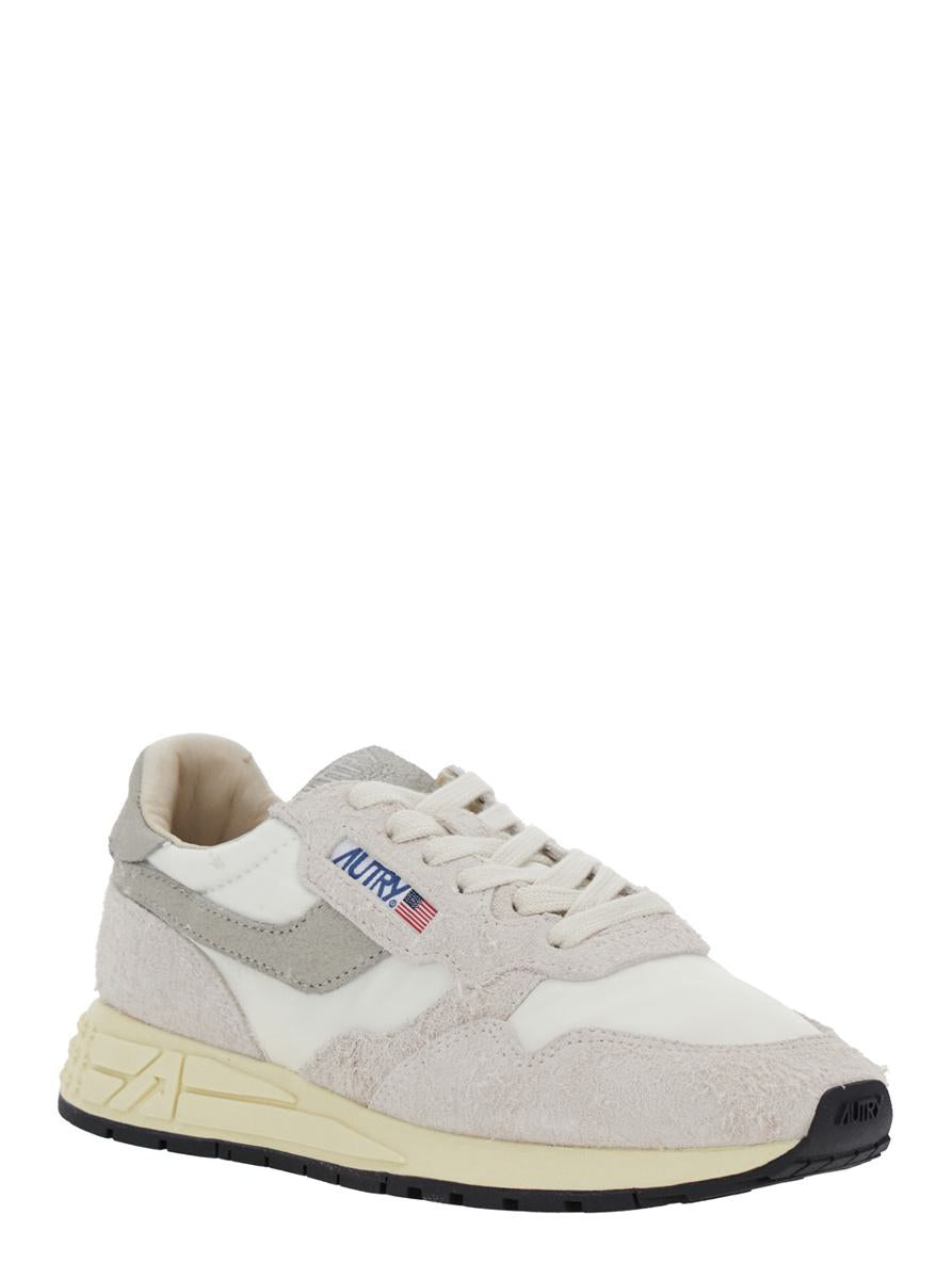 Graue Low-Top-Sneaker „Reelwind“ mit Logo-Patch aus Leder und Stoff für Damen