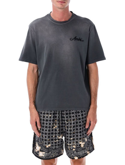 Amiri – Gebleichtes T-Shirt mit Bandana-Patch