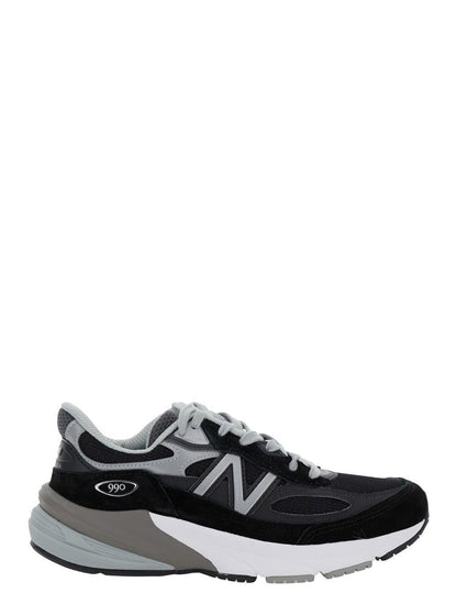 Schwarze Low-Top-Sneakers mit Logo-Detail aus Wildleder und technischem Gewebe für Damen