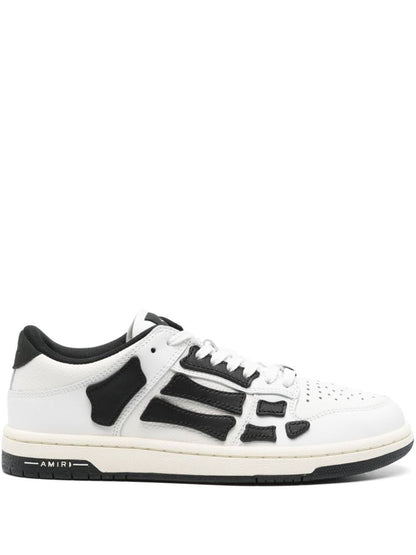 Amiri – Weiße Ledersneaker mit schwarzen Details