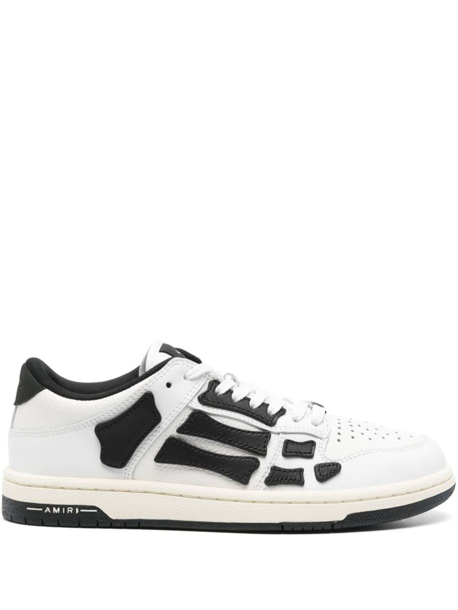 Amiri – Weiße Ledersneaker mit schwarzen Details