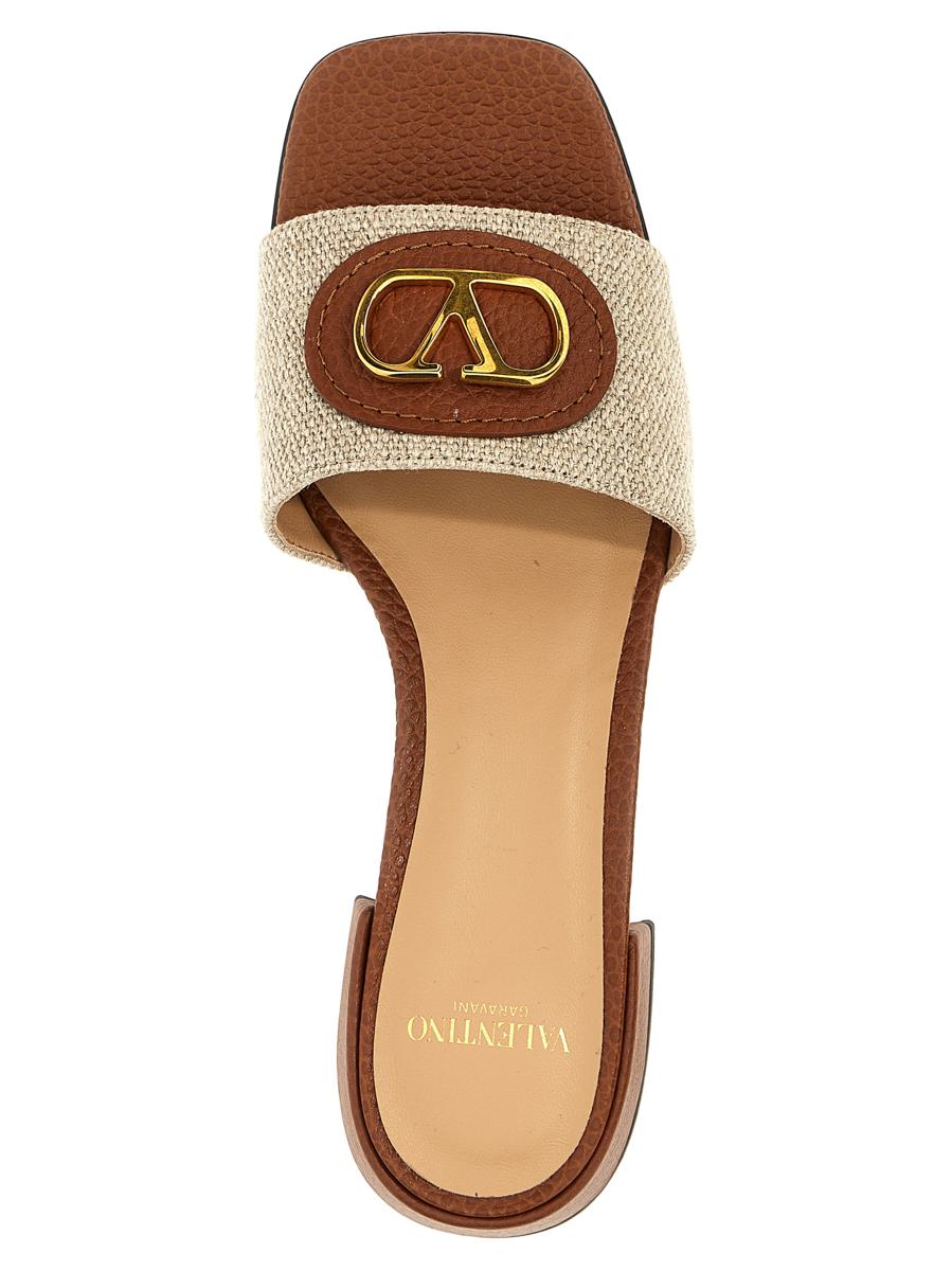 Valentino Garavani Valentino Garavani Vlogo-Slides